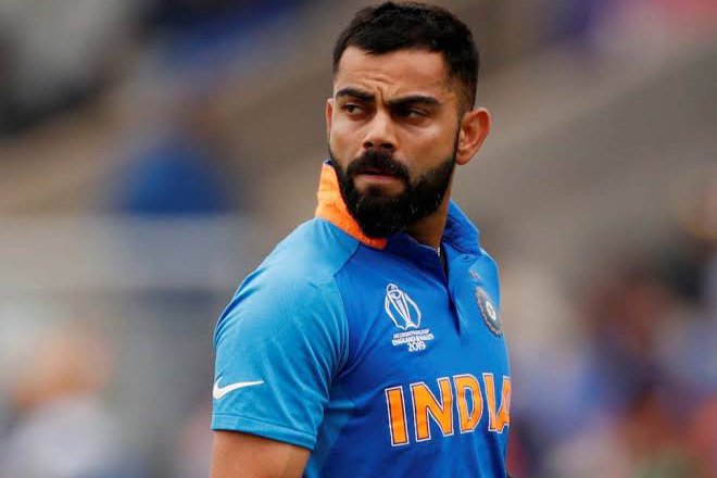 Virat Kohli runs